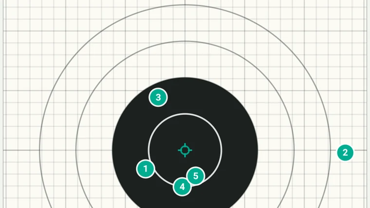 Numbered shot holes on a paper target